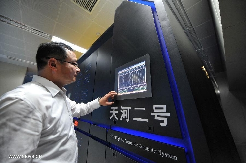 Photo taken on June 16, 2013 shows the supercomputer Tianhe-2 developed by China's National University of Defense Technology. The supercomputer Tianhe-2, capable of operating as fast as 33.86 petaflops per second, was ranked on Monday as the world's fastest computing system, according to TOP500, a project ranking the 500 most powerful computer systems in the world. (Xinhua/Long Hongtao)