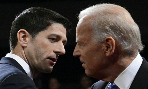 US Vice President Joe Biden (right) and Republican vice presidential candidate Paul Ryan depart the stage following their vice presidential debate at Centre College in Danville, Kentucky, on Thursday night. Photo: AFP