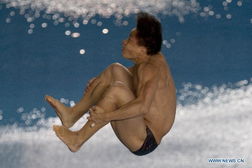  He Chao of China competes during the 3m springboard men's singles final at the International Swimming Federation (FINA) Diving World Series 2013, in Guadalajara, Jalisco, Mexico, on May 25, 2013. (Xinhua/Alejandro Ayala)  