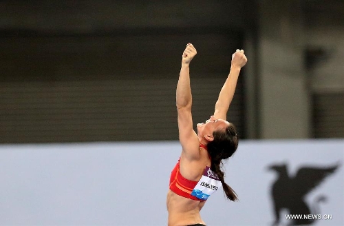 Russia's Yelena Isinbayeva reacts after winning the women's pole vault at the IAAF Diamond League Athletics meet in Shanghai, east China, May 18, 2013. Isinbayeva won the first place of the event with 4.70 meters. (Xinhua/Li Ming) 