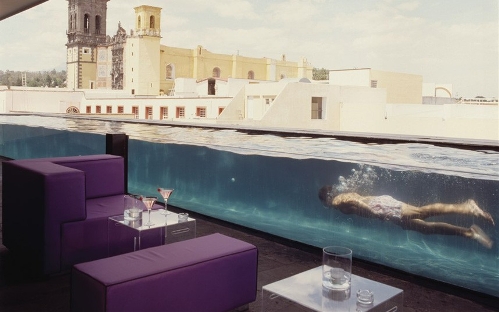 La Purificadora, Puebla, Mexico&nbsp; (Source: www.huanqiu.com)The bar at La Purificadora hotel in Puebla, Mexico, does its best to cater to as many customer desires as possible.It's on the roof; it's open air; there's a nice view of historic buildings; it was designed by Ricardo Legorreta, one of Mexico's most famed architects; and, of course, it flanks a glass-walled swimming pool ideal for guests who fancy a dip between rounds.