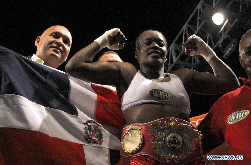  Oxandia Castillo (C) of Dominican Republic celebrates her victory against Hanna Gabriels of Costa Rica during their WBO super welterweight boxing title fight in San Jose, capital of Costa Rica, on Feb. 28, 2013. (Xinhua/Kent Gilbert) (kg)  