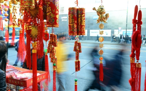 Traditional decorations for the upcoming Chinese Lunar New Year are on sale in China Town, New York, the United States, Feb. 6, 2013. The Chinese Lunar New Year, or Spring Festival, starts on Feb. 10 this year. (Xinhua/Wang Lei)  