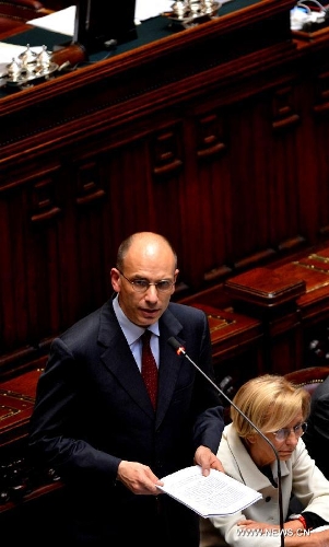 Italian Prime Minister Enrico Letta addresses the parliament in Rome, April 29, 2013. The new prime minister hopes to tackle unemployment figures at close to 12 percent which is higher among the young and move away from austerity imposed by his predecessor Mario Monti. (Xinhua/Xu Nizhi) 
