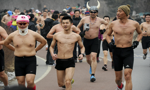 Near-nude man-athon - Global Times