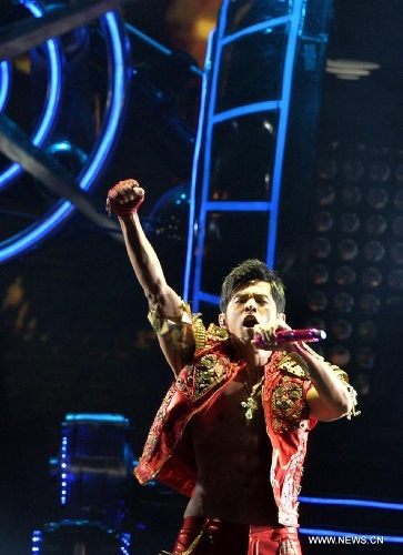 Taiwan singer Jay Chou performs during his concert in Wuhan, capital of central China's Hubei Province, June 29, 2013. (Xinhua) 