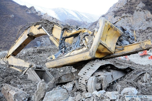Photo taken on March 30, 2013 shows the accident site after a major landslide hit a mining area of Tibet Huatailong Mining Development Co. Ltd, a subsidiary of the China National Gold Group Corporation, in Maizhokunggar County of Lhasa, capital of southwest China's Tibet Autonomous Region. A total of 83 workers were buried in the landslide, which happened on Friday morning. Rescuers have not yet found survivors or bodies 28 hours after the massive landslide. (Xinhua/Zhang Quan) 