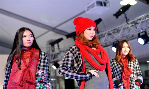 Chinese models wear wool fashions from a local Chinese brand. Photo:CFP