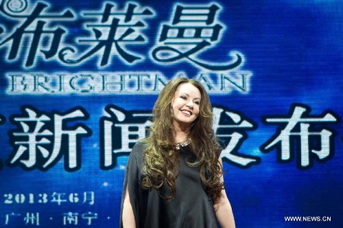 British singer Sarah Brightman looks on at a press conference for her China tour performance in Beijing, capital of China, Feb. 28, 2013. The British soprano will kick off her China tour Dreamchaser in June as she will perform in Beijing, Shanghai, Taipei, Guangzhou, Shenzhen and Nanning. (Xinhua/Zheng Huansong) 