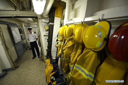 Chief Petty Officer Second Class Rene Tremblay is seen inside the Royal Canadian Navy destroyer HMCS Algonquin during a media presentation in Vancouver, Canada, on April 26, 2013. Approximately 1,000 Canadian and American sailors are in Vancouver to meet members of the public and media to bring the Navy to the Canadians. (Xinhua/Sergei Bachlakov)