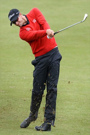 Adam Scott of Australia plays during the first round of the Australian Masters golf tournament in Melbourne on Thursday. Photo: AFP