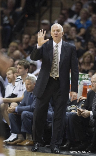San Antonio Spurs head coach Gregg Popovich gestures during the Game 3 of the 2013 NBA Finals against Miami Heat in San Antonio, Texas, the United States, June 11, 2013. San Antonio Spurs won 113-77. (Xinhua/Yang Lei)