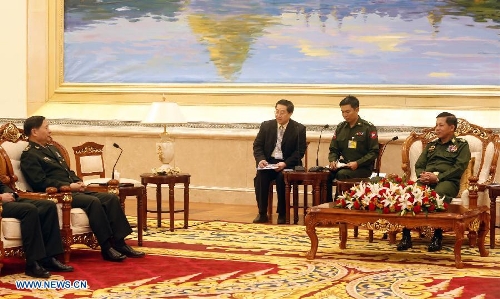 Commander-in-chief of Myanmar's Defence Services Vice-Senior General Min Aung Hlaing (1st R) meets with visiting Deputy Chief of General Staff of the Chinese People's Liberation Army Qi Jianguo (1st L) in Nay Pyi Taw, capital of Myanmar, on Jan. 20, 2013. Qi jianguo arrived here Saturday for the first China-Myanmar strategic security consultation. (Xinhua/U Aung)