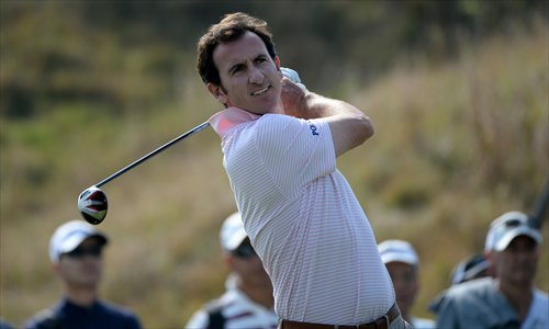 Gonzalo Fernandez-Castano of Spain tees off at the eighth hole on the final day of the BMW Shanghai Masters golf tournament at the Lake Malaren Golf Club on Sunday. Photo: AFP