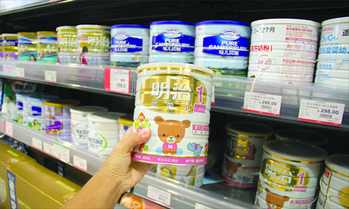Foreign-branded infant formula products are seen on the shelf of a supermarket in Guangzhou, South China's Guangdong Province Wednesday. Photo: CF