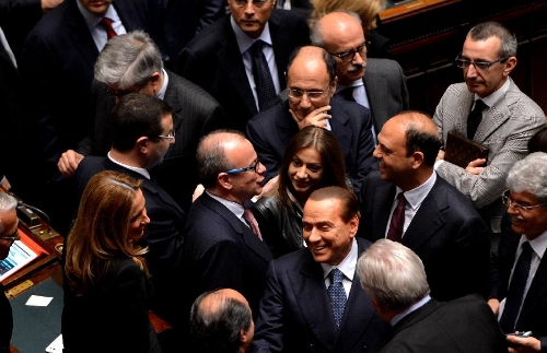 &nbsp;Silvio Berlusconi (3rd front R), the leader of the freedom of people, appears in parlament in Rome, Italy, on April 20, 2013. Italian President Giorgio Napolitano on Saturday won election for a second mandate in a move to solve Italy's political impasse. (Xinhua/Xu Nizhi) 