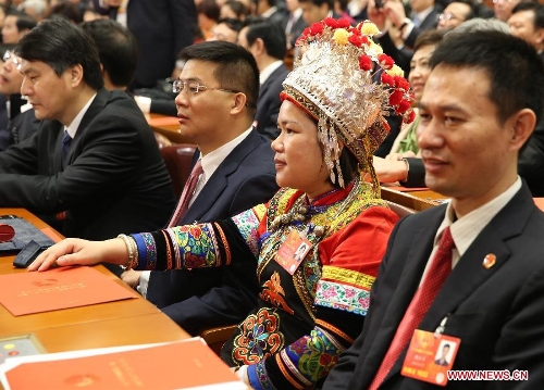  Deputies attend the closing meeting of the first session of the 12th National People's Congress (NPC) at the Great Hall of the People in Beijing, capital of China, March 17, 2013. (Xinhua/Chen Jianli)