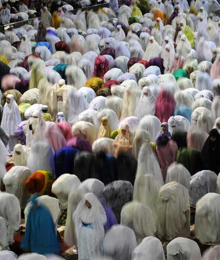 Indonesian muslims offer the evening prayer 