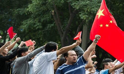 Protesters gather in front of the Japanese embassy in Beijing on Tuesday. Photo: Li Hao/GT