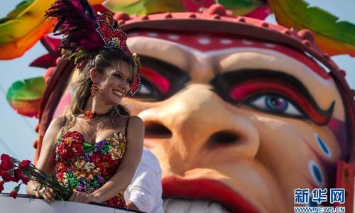 A performer participates in the carnival in Barranquilla, Colombia, February 10, 2013. Photo: Xinhua