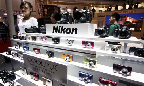 Nikon camera products on display at a photography equipment show in Beijing. Photo: CFP