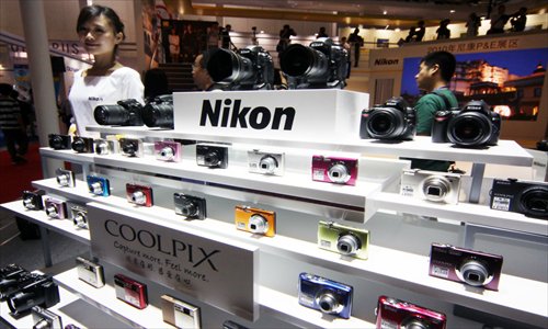 Nikon camera products on display at a photography equipment show in Beijing. Photo: CFP