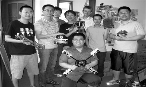 Main: Open Drone's Wi-Fi car on patrol 
Inset: Some members of the Open Drone team Photos: Courtesy of Open Drone 2