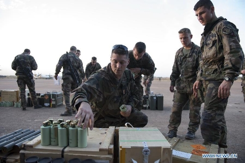 Photo released by the French Defense Ministry shows French soldiers getting prepared at the Bamako military airport as part of the 