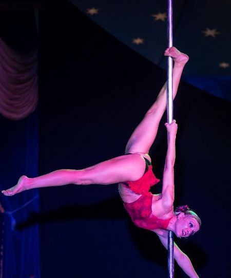Eszter Szlavy of Hungary performs during the Miss Poledance Hungary competition in Budapest, Hungary on September 22, 2012. Photo: Xinhua