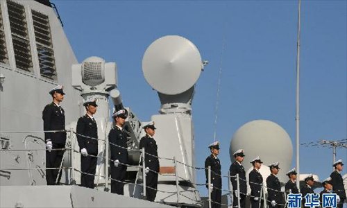 The 13th escort taskforce under the Navy of the Chinese People's Liberation Army (PLA), which just completed the escort mission in the Gulf of Aden and the waters off the Somali coast, arrived at the Casablanca Port of Morocco on April 9, 2013, starting its five-day-long visit to the country. This is the first time for a Chinese naval fleet to visit Morocco. The picture shows the officers and men of the 