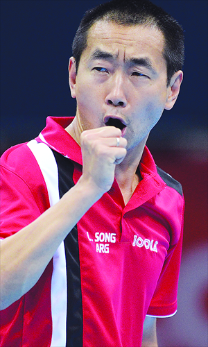 Argentina's Liu Song, born in China, celebrates winning a point during a table tennis men's singles preliminary round match of the London Games on Saturday. Photo: AFP