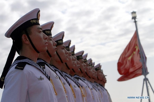 Chinese naval soldiers stand guard for inspections at the habour of Algiers, Algeria, on April 2, 2013. The 13th naval escort squad, sent by the Chinese People's Liberation Army (PLA) Navy, arrived at Algiers of Algeria on Tuesday for a four-day visit after finishing its escort missions. (Xinhua/Mohamed Kadri) 