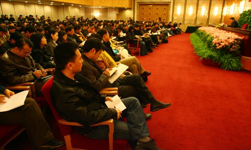 Journalists receive training at the Great Hall of the People on March 1, 2009. Photo: CFP