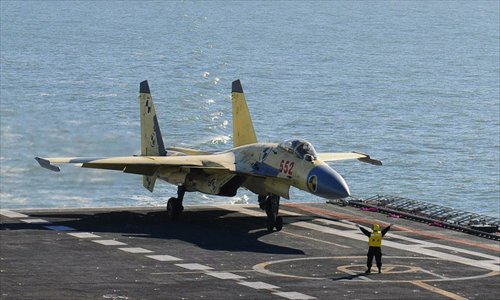 Photo shows carrier-borne J-15 fighter jet on China's first aircraft carrier, the Liaoning. Photo: mil. cnr.cn