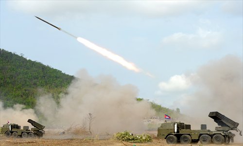Cambodian soldiers test fire a multiple rocket launcher (BM21) at a military base in Kampong Speu province, some 70 kilometers west of Phnom Penh on Tuesday. Cambodia's military drill of multiple rocket launchers and artillery 130-mm is aimed at strengthening its national defense ability. Photo: AFP