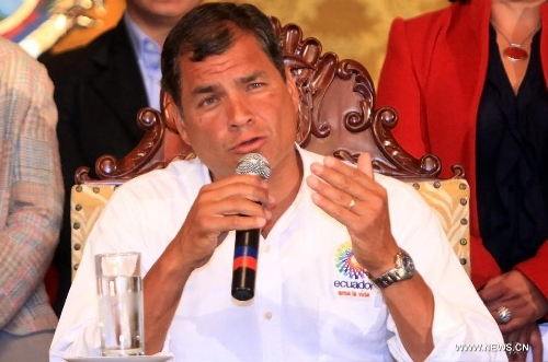 Ecuador's President Rafael Correa gives a speech after the news of Venezuelan President Hugo Chavez's death was released, in Quito, Ecuador, on March 5, 2013. Rafael Correa expressed his condolences on Venezuelan President Hugo Chavez's death and declared three days of national mourning in Ecuador. Venezuelan President Hugo Chavez died on March 5. (Xinhua/Santiago Armas)