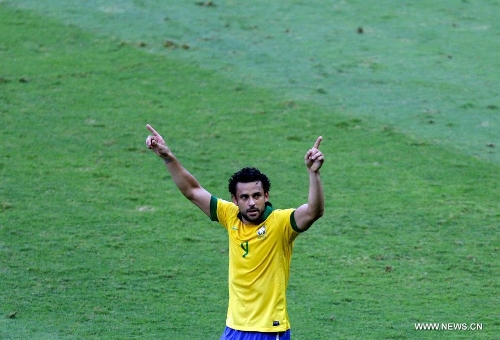 Brazil's Fred celebrates after scoring during the FIFA's Confederations Cup Brazil 2013 semifinal match against Uruguay, held at Mineirao Stadium, in Belo Horizonte, Minas Gerais state, Brazil, on June 26, 2013. (Xinhua/David de la Paz)