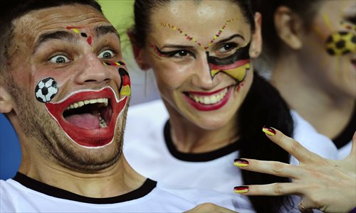 Germany fans celebrate after their team won the match. Photo: IC