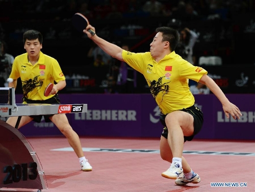  Hao Shuai and Ma Lin (R) of China compete during the final of men's doubles against Chen Chien-An and Chuang Chih-Yuan of Chinese Taipei at the 2013 World Table Tennis Championships in Paris, France on May 19, 2013. Hao and Ma lost the match 2-4.(Xinhua/Tao Xiyi) 