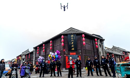 Police operate a drone to monitor illegal fireworks in Huaxian county, Henan Province. Photo: CFP