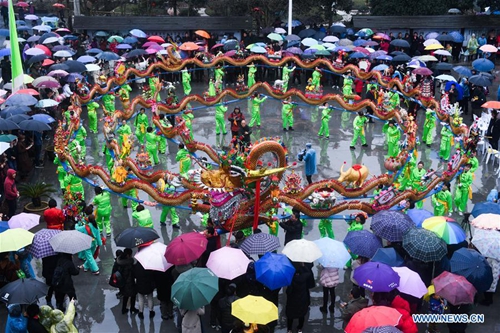 Wooden-bench dragon dance performed to celebrate Chinese Lantern ...