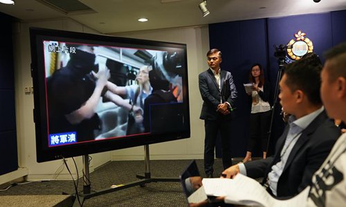 Officer injured in knife attack still in ICU: Hong Kong police - Global ...