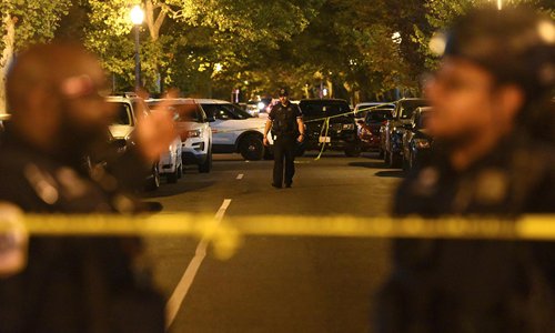 Police hunt for two suspects in fatal shooting in Washington, DC ...