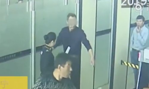 Security finds lighter in smoker's mouth
