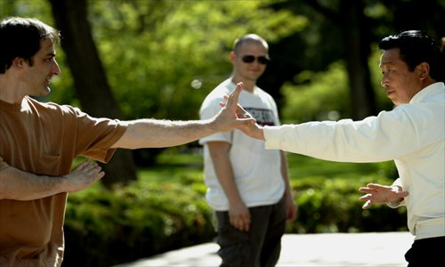 A Chinese shifu teaches foreigners kung fu in Beijing. Photo: CFP