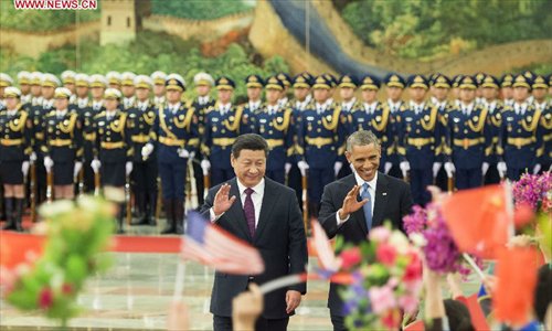 Xi, Obama hold talks in Beijing