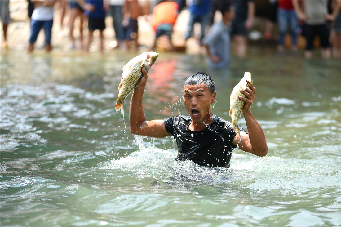 miao people fishes for good harvest at fish-catc