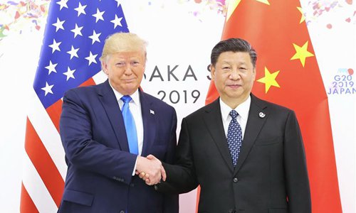 Trump says not hostile towards China