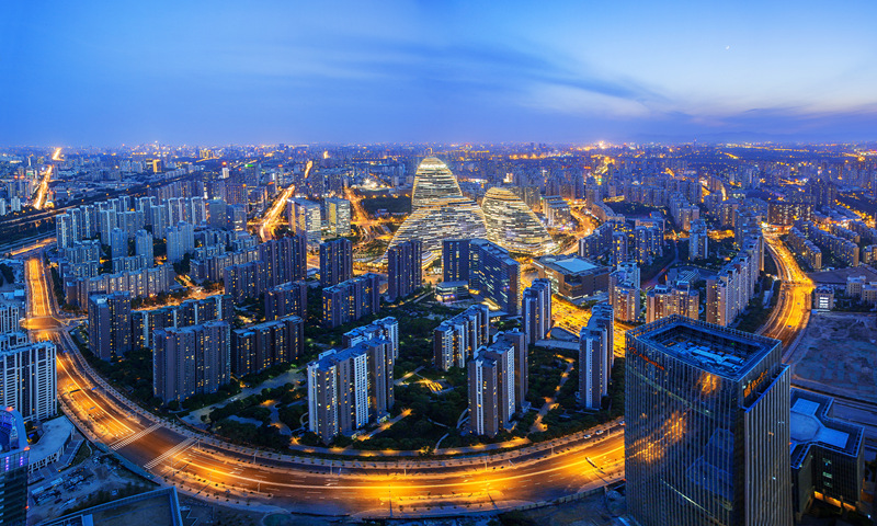 A view of Wangjing SOHO at dusk in Beijing Photo: VCG