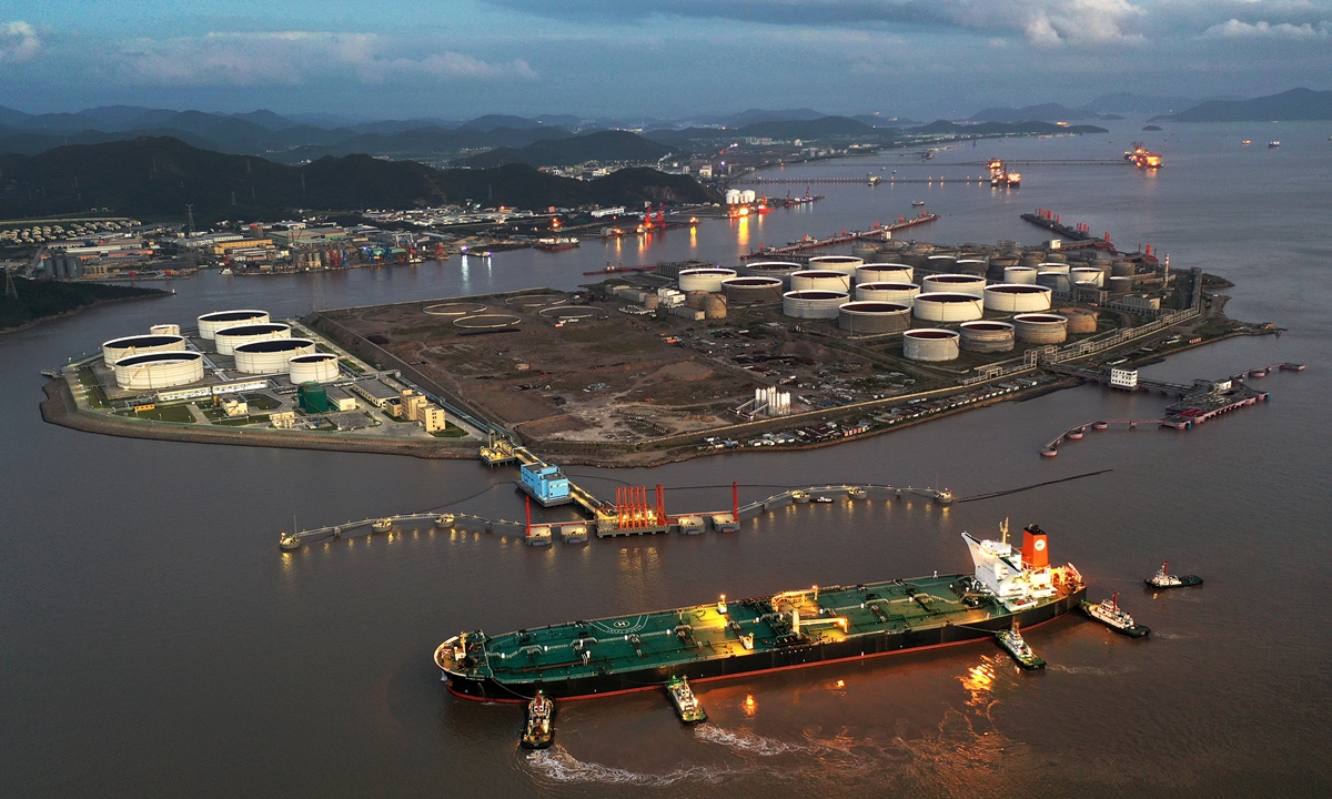 An oil tanker berths at a receiving facility at the Port of Zhoushan, East China’s Zhejiang Province. The tanker, Olympic Trust, is the third 300,000-ton vessel to arrive at the port so far this month. In August, China imported 47.48 million tons of crude, according to National Bureau of Statistics data. Photo: cnsphoto